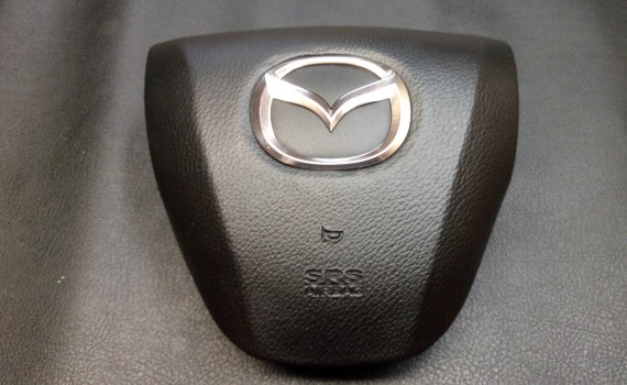 Ремонт накладки на руль Mazda 3
