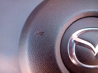 Ремонт накладки на руль Mazda CX7