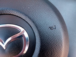 Ремонт накладки на руль Mazda CX7